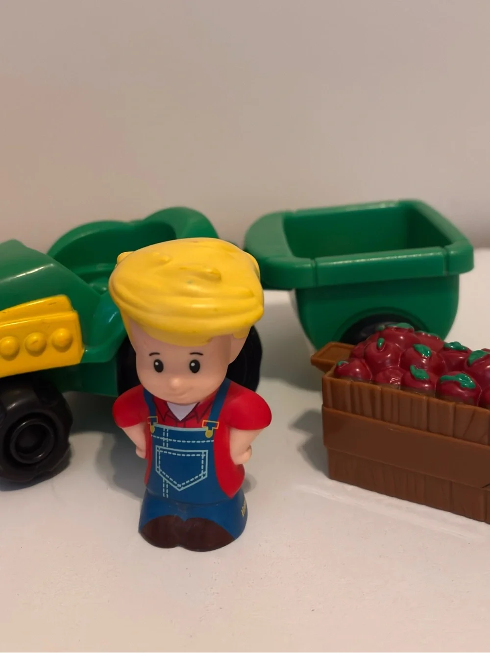 Fisher-Price Green Tractor with Farmer Figure and Apple Trailer